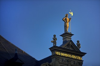 Statue of a national servant on the guildhall at the fish market, Erfurt, Thuringia, Germany,