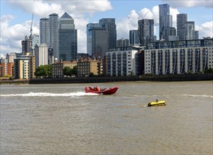 Thames Rockets speedboat adventure rigid inflatable jet boat, Canary Wharf, River Thames, London,