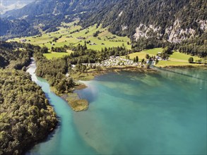 The Vorauen campsite on Lake Klöntal with the Chlü tributary, Klöntal, Canton Glarus, Switzerland,