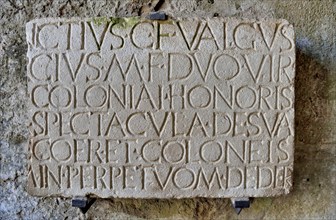 Roman inscription at the entrance to the amphitheater, ancient city of Pompeii, Campania, Italy,