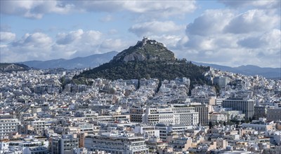 View over houses of Athens with Mount Lycabettus, Athens, Attica, Greece, Europe