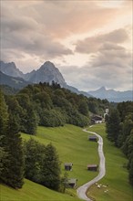 View of St Anna in Wamberg. The Alpspitze near Garmisch-Partenkirchen in the background