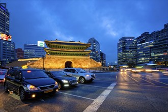 Seoul, South Korea, April 1, 2016 : Namdaemun Gate Sungnyemun at night with city traffic, Seoul,