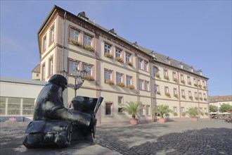 Baroque Town Hall and sculpture The Newspaper Reader by Franz Werner Müller Steinfurth 1952 on