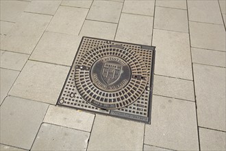 Manhole cover with city coat of arms and inscription County town Limburg a. d. Lahn, Europaplatz,