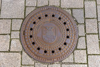 Manhole cover of the town of Schrobenhausen, Upper Bavaria, Germany, Europe