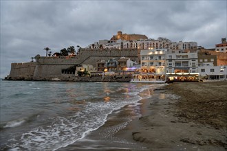 Old town with the Romanesque castle from the 14th century, blue hour, Peñíscola, province