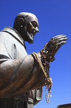 Castellammare del Golfo, statue of Padre Pio of Pietrelcina with prayer chains on his right hand,