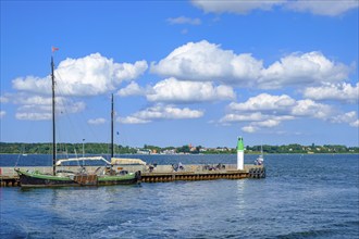 The two-masted sailing ship ALFRED at the northern pier in the harbour of the Hanseatic city of