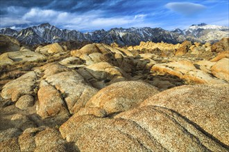 Granite boulder with Sierra Nevada mountain range in background, Lone Pine Peak, 12994, feet, Mt.