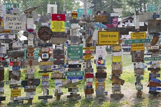 Place and traffic signs in the signpost forest, Watson Lake, Yukon Territory, Alaska Highway,