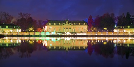 Illuminated Benrath Palace with wing building in the evening at Christmas Wunderwelt, Düsseldorf,