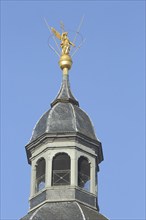 Spire with golden figure on the Einhard Basilica of St. Marcellinus and Peter, golden, gilded,