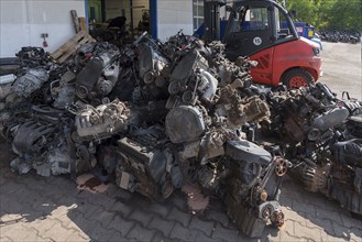 Engines in a scrap yard, collected for export to Africa, Bavaria, Germany, Europe