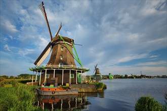 Netherlands rural lanscape, windmills at famous tourist site Zaanse Schans in Holland. Zaandam,