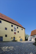 Ensemble of buildings at Münsingen Castle, on the left Old Castle, fruit cellar, town castle built