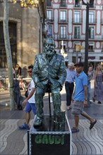 Street performer, mime, living statue of Antoni Gaudi, pedestrian in the city centre, Barcelona,