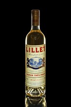 Minsk, Belarus, April 5, 2018, bottle of flavored wine Lillet isolated on black, Europe