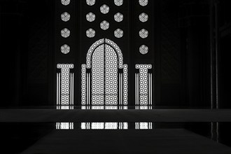 Light incidence in the darkness, interior door and window, arabesque, ornaments in the Hassan II