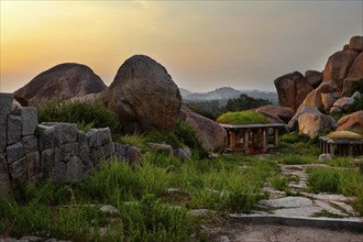 Ancient ruins in Hampi on sunset. Above Hampi Bazaar, Hampi, Karnataka, India, Asia