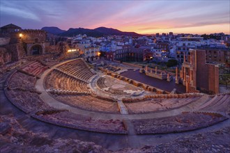 Teatro Romano, blue hour, Roman amphitheater, in the old town of Cartagena, Murcia region, Spain,