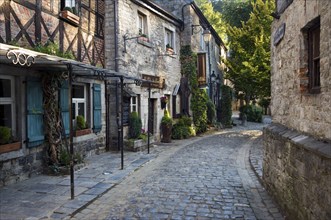 Houses and restaurants in natural stone in an alley in Durbuy, smallest town in the world,