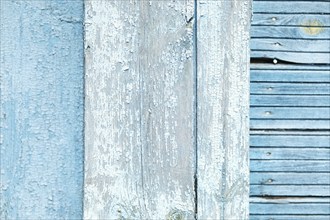 Abstract wooden background. Cracked paint on the wall