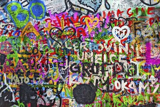 PRAGUE, CZECH REPUBLIC, APRIL 28, 2012: Lennon Wall is filled with John Lennon-inspired graffiti