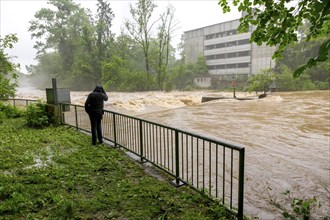 Symbolic image extreme weather, global warming, climate change, flood, flooded weir in Remseck an