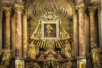 Image of the Virgin Mary on the altar of the baroque parish church Mariahilfer Kirche in Vienna,