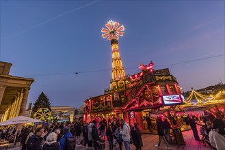 Stuttgart Christmas market at the blue hour. Christmas pyramid on the Schlossplatz in front of the