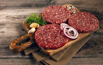 Raw cutlets, for burgers, minced meat, handmade, homemade, with spices, top view, no people