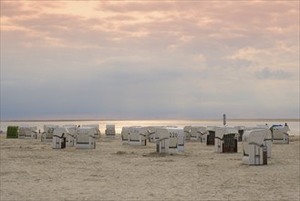 Beach chairs on the sandy beach, evening mood, Norddeich, Norden, East Frisia, Lower Saxony,