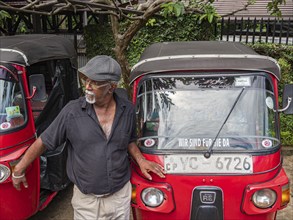 Tuktuk driver and taxi, Sri Lanka, Asia