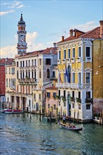 VENICE, ITALY, JUNE 27, 2018: Grand Canal with boats and gondolas on sunset, Venice, Italy, Europe