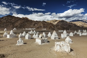 Whitewashed chortens (Tibetan Buddhist stupas) . Nubra valley, Ladakh, India, Asia