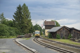 Modern railcar of the narrow gauge railway enters the station, Weitra, Lower Austria, Austria,