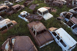 Old abandoned car cemetery ai generated