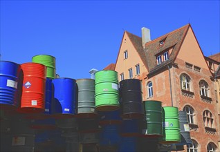 In the historic centre of Nuremberg, art with barrels in front of the Neues Museum Nuremberg,