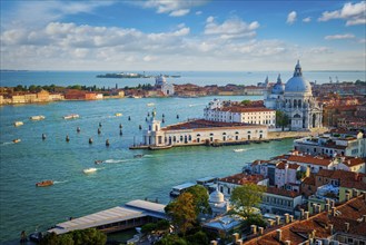 View of Venice lagoon and Santa Maria della Salute church on summer day. Venice, Italy, Europe