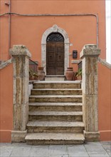 Door with staircase, Sorano, Tuscany, Italy, Europe