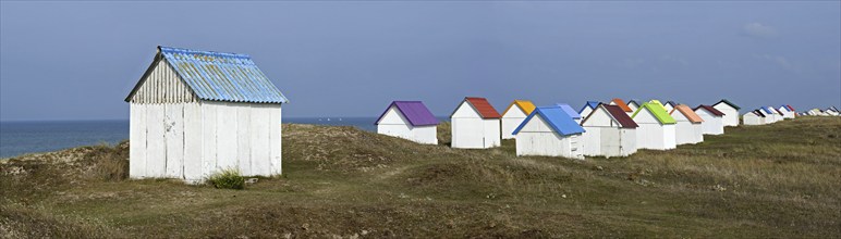 Colourful beach cabins at Gouville-sur-Mer, Lower Normandy, France, Europe