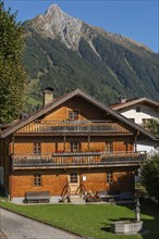 Farmhouse, wooden architecture, front, well, balcony, village Brandberg, district Schwaz,