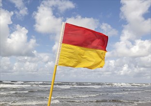 Bathing area marked with a red-yellow flag and secured by lifeguards, Vejers, Denmark, 17 07 2023,