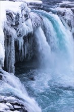 Godafoss waterfall, icy and snowy rock face, Northern Iceland Eyestra, Iceland, Europe