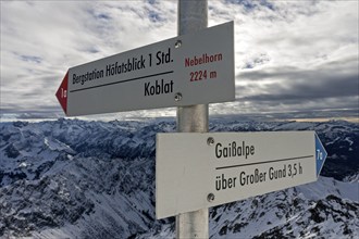 Hiking signpost on the Nebelhorn, in the background the Allgäu Alps, Oberstdorf, Oberallgäu,