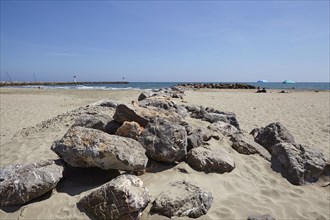 Stone groyne on the beach at Frontignan, Hérault, Occitania, France, Europe