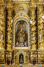 Baroque altar with gold leaf in the historic church of Pelourinho in the city of Salvador, Bahia,