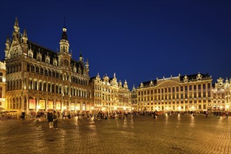 BRUSSELS, BELGIUM, MAY 31, 2018: Grote Markt Grand Place square crowded with tourists illuminated