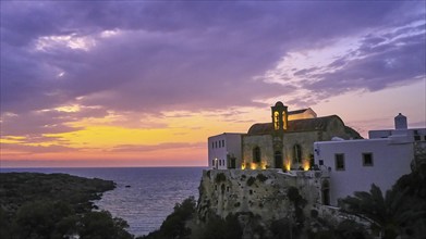 Dusk, sunset, cloudy sky, artificial lights, Chrissoskalitissa, rock monastery, Orthodox monastery,